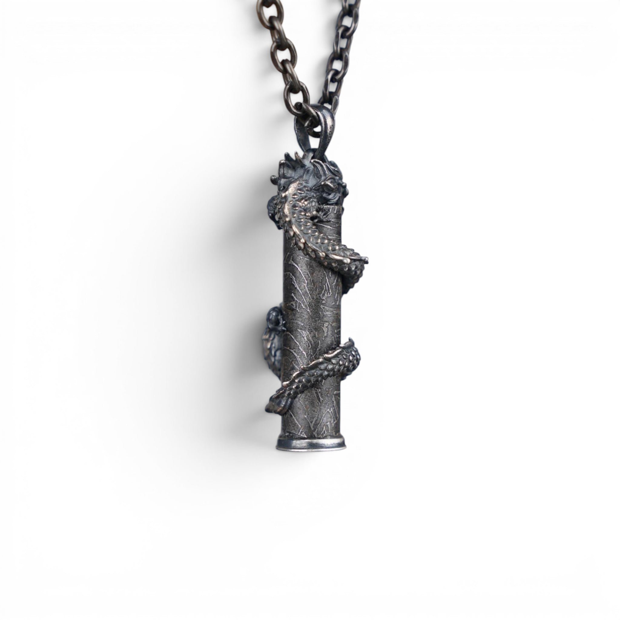 The Dragon — sterling silver dragon pendant worn at the chest, men's statement jewellery.