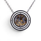 The Pallas Orrery — front view of the orrery pendant on dark background.