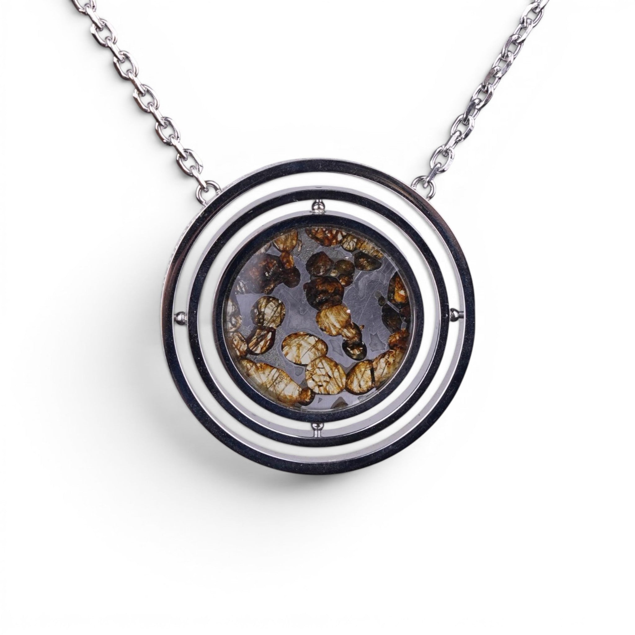 The Pallas Orrery — front view of the orrery pendant on dark background.