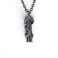 The Dragon — front view of the dragon pendant on dark luxury background.