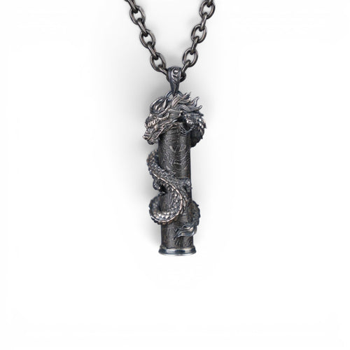 The Dragon — front view of the dragon pendant on dark luxury background.