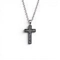 The Cross — angled view of the cross pendant showing depth and the polished titanium-grade steel frame.